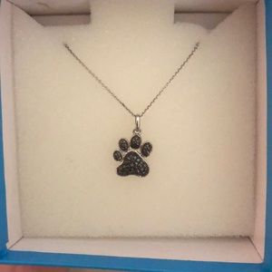 Piercing Pagoda dog paw necklace, never worn!
